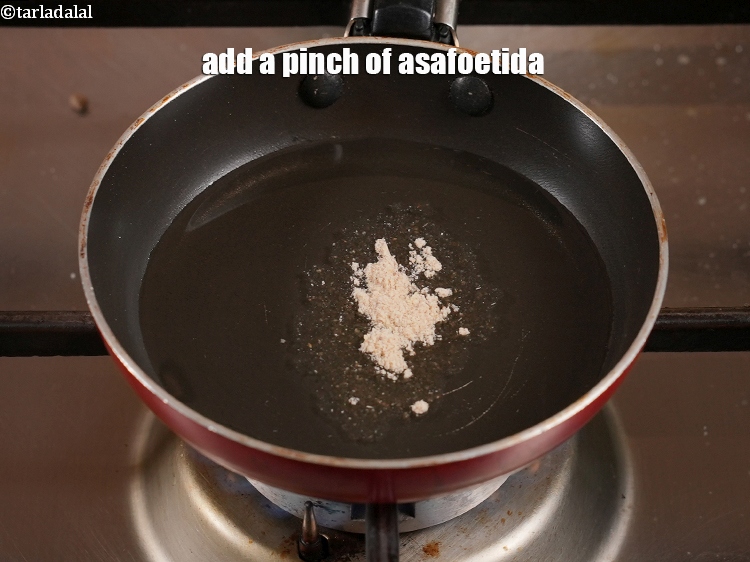 Step 35 – Add a pinch of asafoetida.