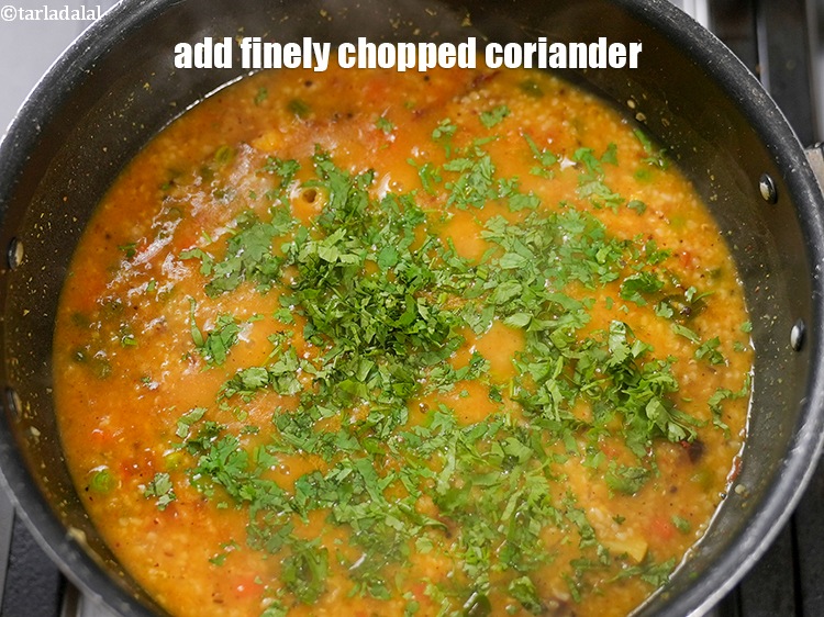 Step 35 – Add 2 tbsp finely <a href="https://www.tarladalal.com/glossary-chopped-coriander-783i">chopped coriander (dhania)</a>.