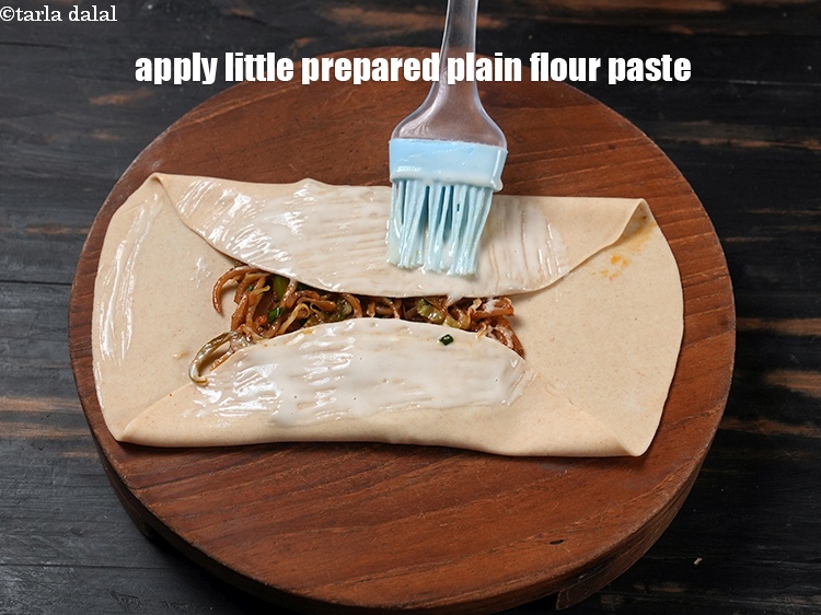 Step 35 – Now apply little prepared plain flour paste using a brush.