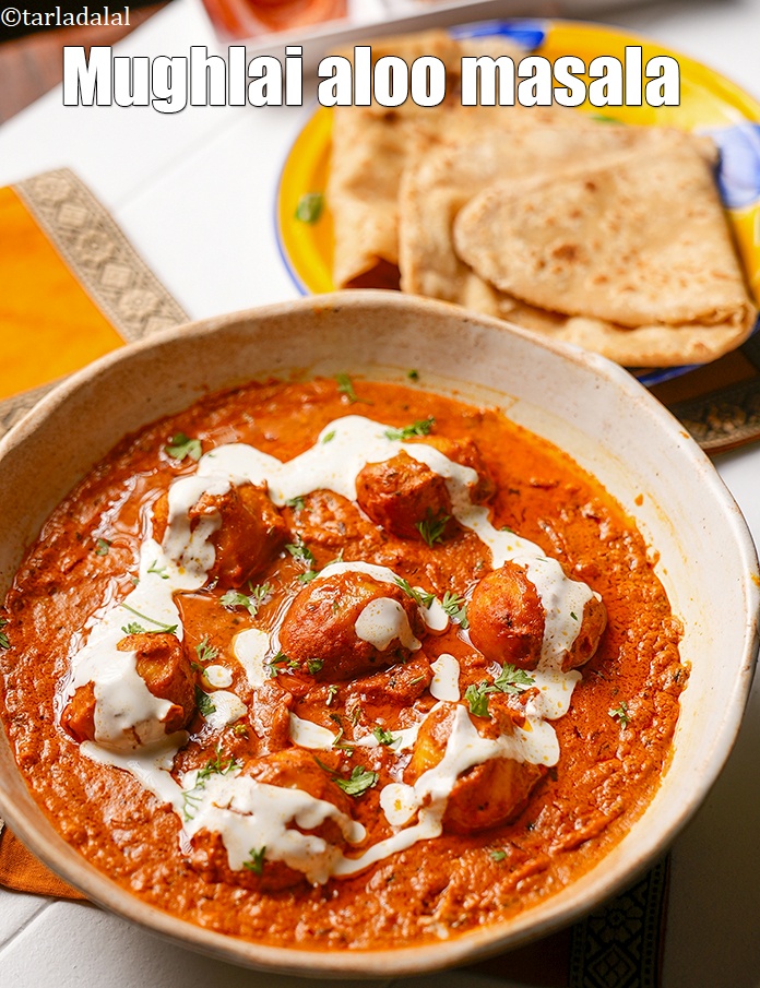 Step 34 – Serve<strong> batata musallam</strong> hot garnished with coriander.