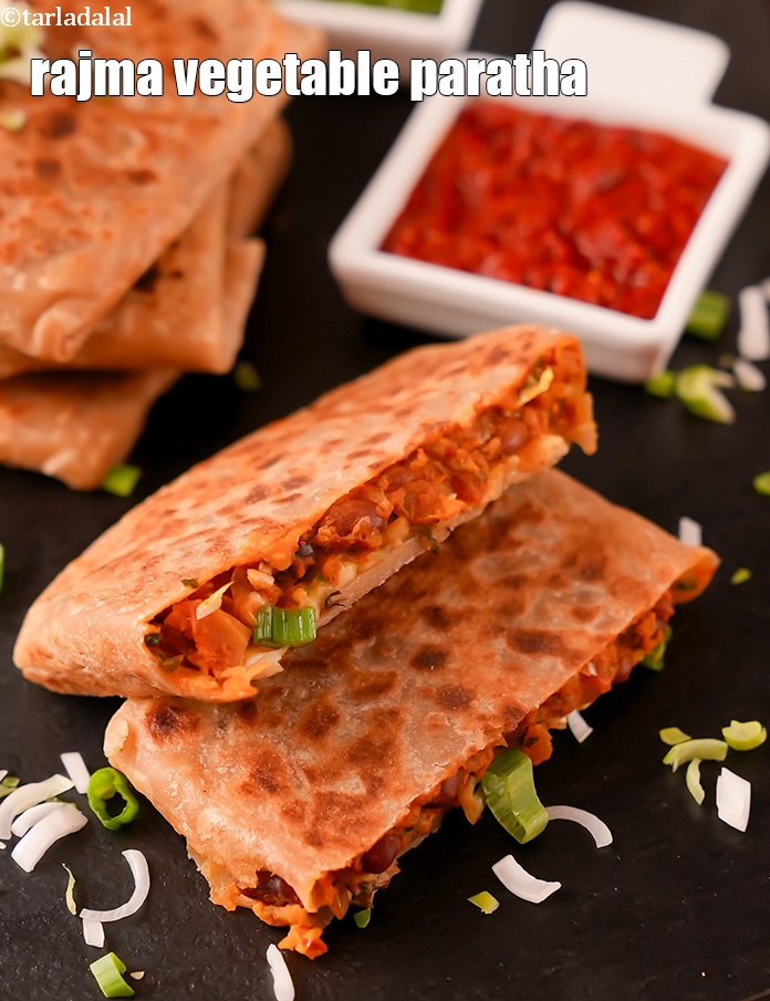 Step 55 – Cut each paratha diagonally across.&nbsp;Serve&nbsp;<strong>rajma cheese paratha recipe | rajma vegetable paratha | stuffed kidney …