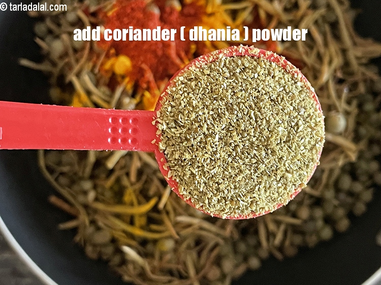 Step 38 – Add 1&nbsp;tbsp&nbsp;<a href="glossary-coriander-powder-dhania-powder-370i">coriander (dhania) powder</a>.