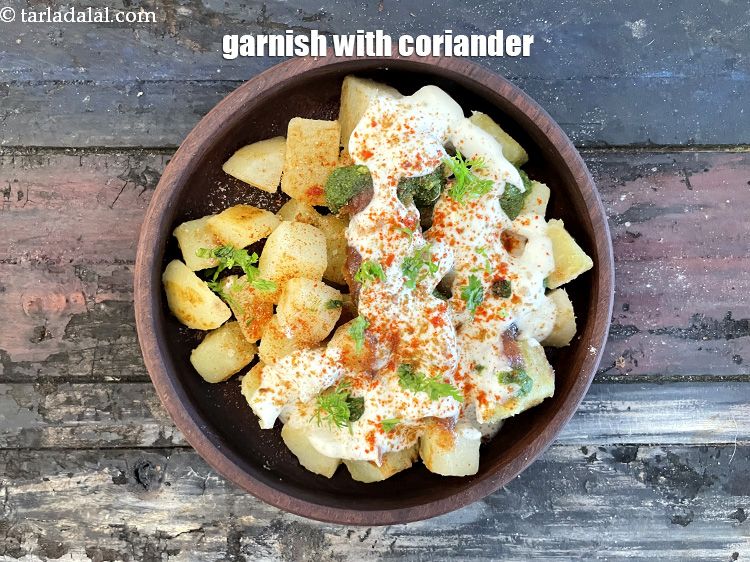 Step 35 – Garnish with coriander.