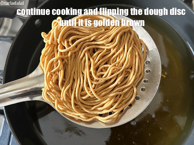 Step 36 – Continue cooking and flipping the dough circle until it is golden brown. &nbsp;