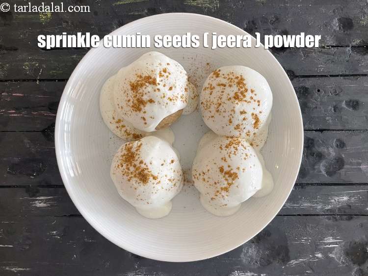 Step 35 – <meta charset="UTF-8" />Sprinkle &frac12; tsp of cumin seeds powder.