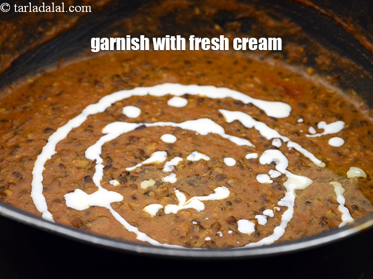 Step 35 – Garnish with 1 tbsp <a href="https://www.tarladalal.com/glossary-fresh-cream-1877i">fresh cream</a>.
