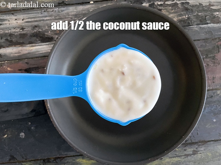 Step 36 – <meta charset="UTF-8" /> Pour &nbsp;1/2&nbsp;of the prepared coconut sauce over.