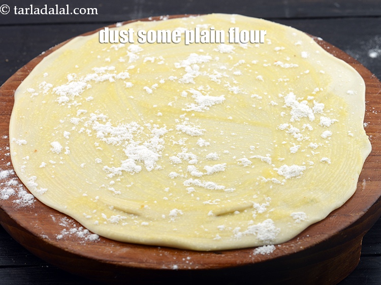 Step 42 – Dust some plain flour.