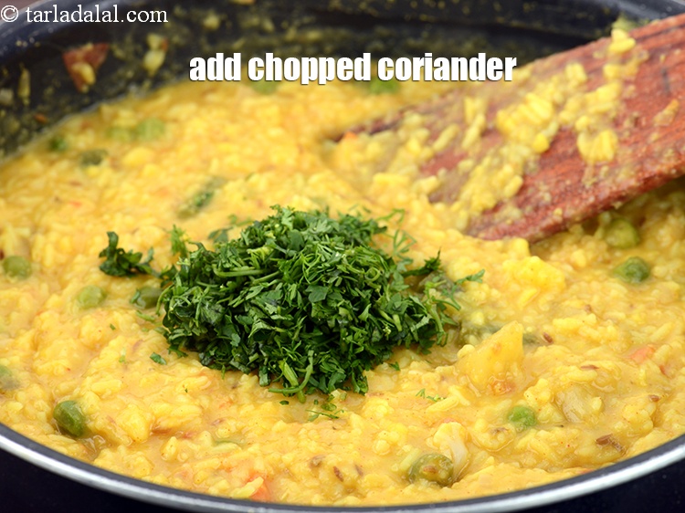 Step 36 – Add 2 tbsp <a href="https://www.tarladalal.com/glossary-chopped-coriander-783i">chopped coriander (dhania)</a>&nbsp;