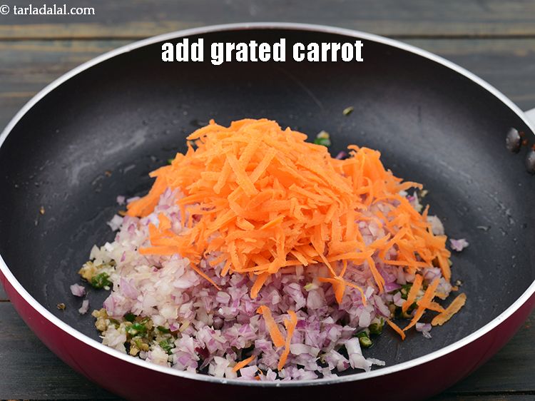 Step 37 – Add&nbsp;1&nbsp;cup&nbsp;<a href="https://www.tarladalal.com/glossary-grated-carrot-816i">grated carrot</a>.