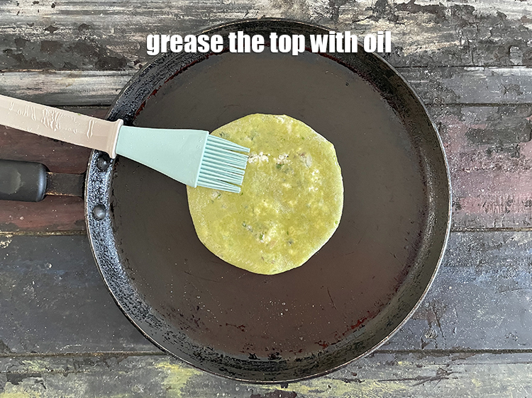 Step 38 – Grease paratha with oil.