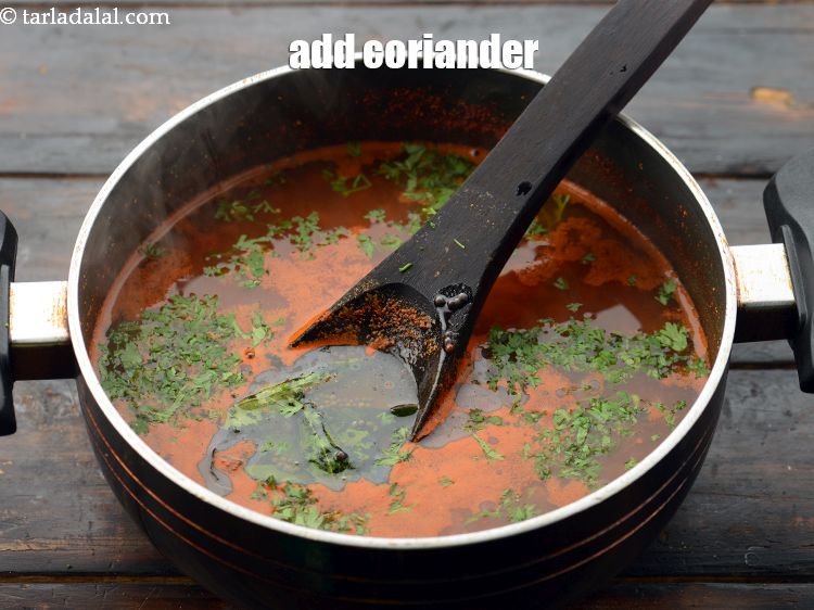 Step 40 – Add&nbsp;2 tbsp&nbsp;finely&nbsp;<a href="glossary-chopped-coriander-783i">chopped coriander (dhania)</a>