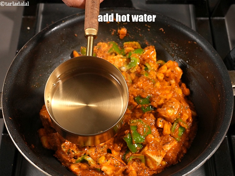 स्टेप 36 – 1 कप गरम पानी डालें.