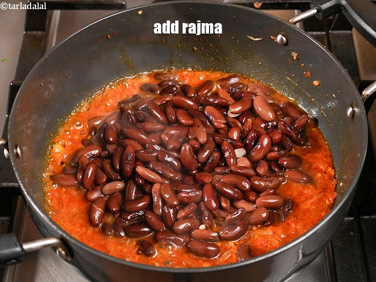 Step 36 – Add 2 cups <a href="https://www.tarladalal.com/glossary-rajma-kidney-beans-197i">rajma (kidney beans)</a>.