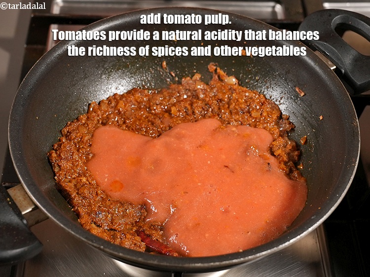 Step 36 – Add 1 cup <a href="https://www.tarladalal.com/glossary-tomato-pulp-tamatar-ka-pulp-1039i">tomato pulp</a>. Tomatoes provide a natural acidity that balances the richness …