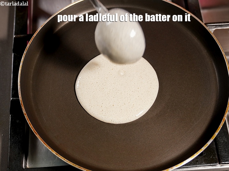 Step 36 – Pour a ladleful of the batter on it.