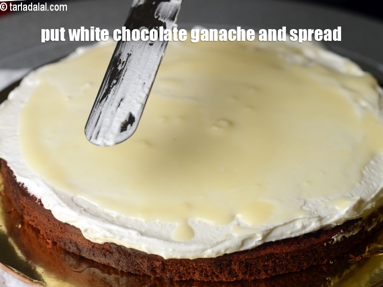 Step 40 – Put 2 tbsp of white chocolate ganache and spread it evenly.