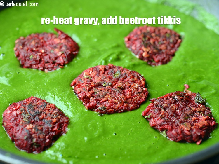 Step 37 – Just before serving, re-heat the gravy, add the beetroot tikkis.&nbsp;