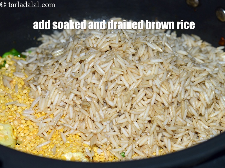 Step 37 – Add soaked and drained brown rice.