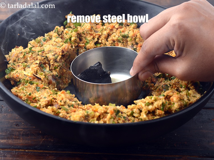 Step 36 – Remove the steel bowl.