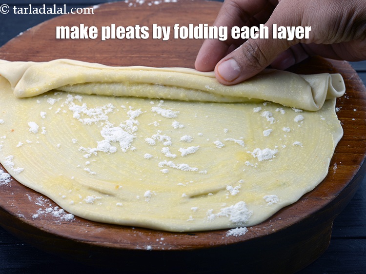 Step 43 – Now make pleats by folding each layer on one another.