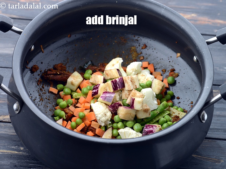 Step 37 – Add 1/4 cup&nbsp;<a href="https://www.tarladalal.com/glossary-brinjal-cubes-132i">brinjal (baingan / eggplant) cubes</a>.&nbsp;