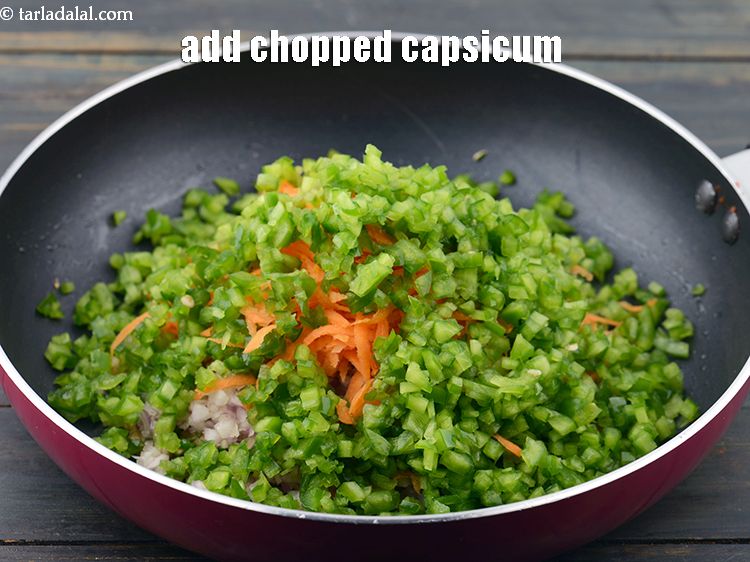 Step 38 – Add 1&nbsp;cup&nbsp;finely&nbsp;<a href="https://www.tarladalal.com/glossary-chopped-capsicum-164i">chopped capsicum</a>. If you have coloured capsicum you can use that also.