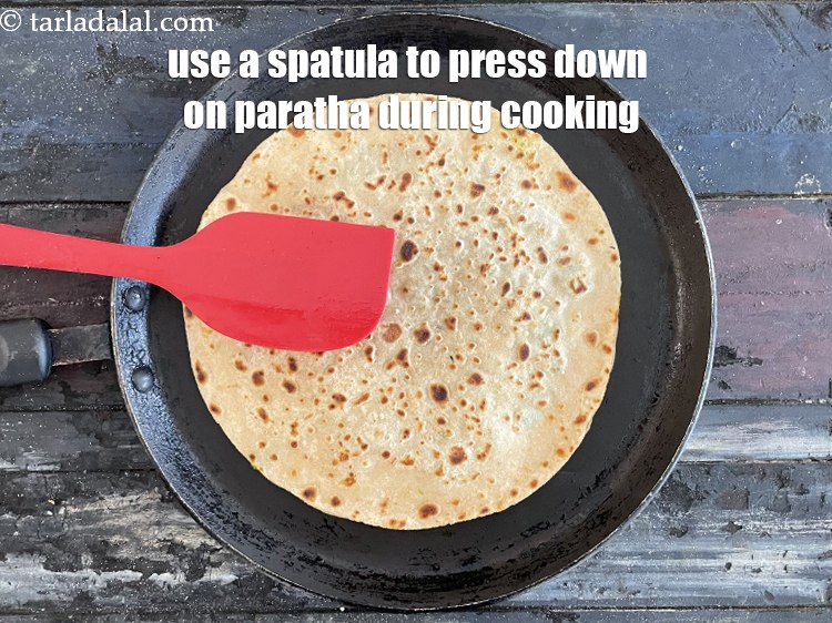 Step 38 – <meta charset="UTF-8" />Cook the other side the same way and use a spatula to press …
