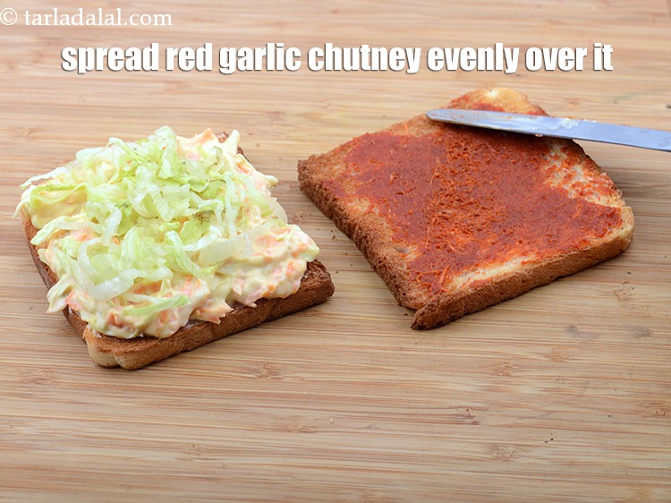 Step 37 – Spread 1 tsp of <a href="https://www.tarladalal.com/red-garlic-chutney-2865r">red garlic chutney</a> evenly over it.