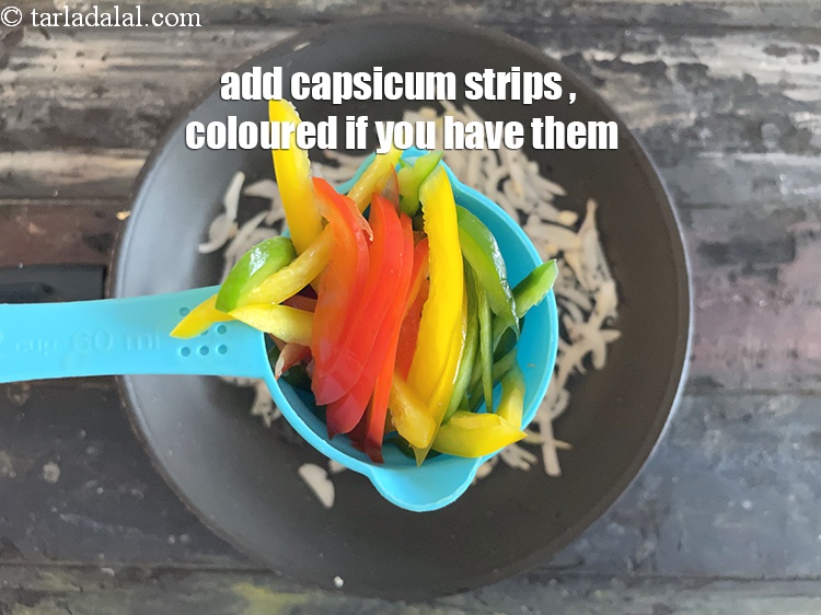 Step 38 – <meta charset="UTF-8" />Add the <meta charset="UTF-8" />1/2 cup&nbsp;<a href="glossary-sliced-capsicum-165i">capsicum strips</a>.