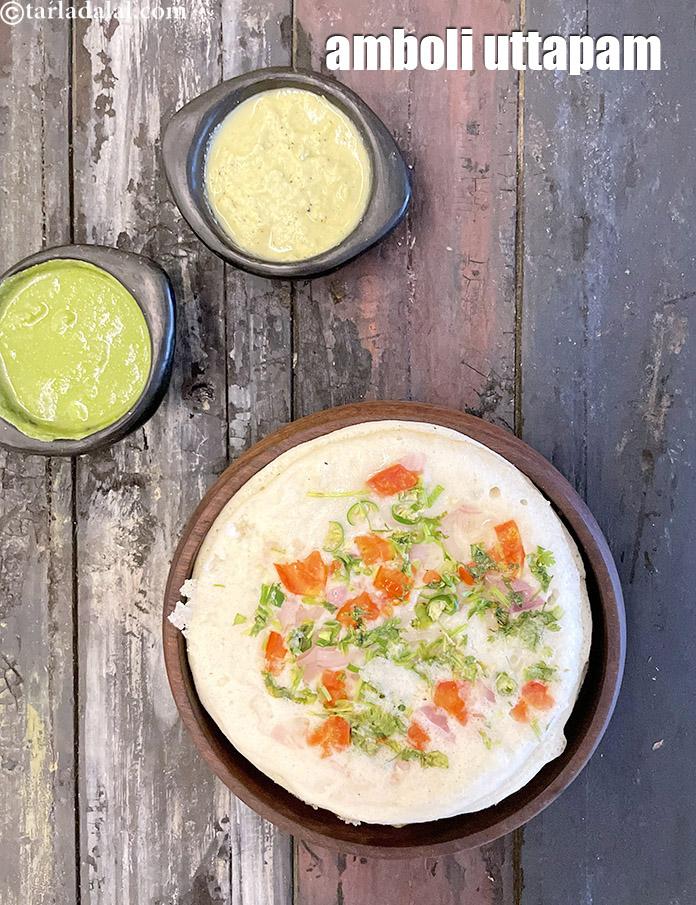 Step 49 – Flip over and your <strong>amboli uttapam</strong> is ready. Serve <strong>amboli uttapam&nbsp;</strong>with green chutney and coconut …