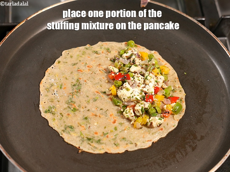 Step 37 – Place one portion of the stuffing mixture on the pancake.