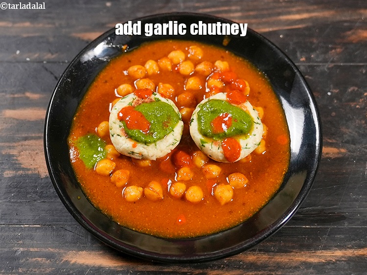 Step 36 – Add 1 tsp <a href="https://www.tarladalal.com/garlic-chutney-573r">garlic chutney</a>.