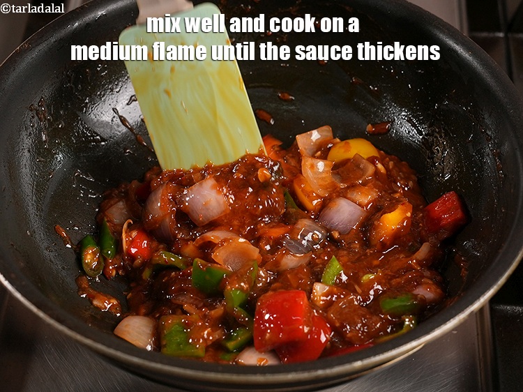 Step 37 – Mix well and cook on a medium flame until the sauce thickens, while stirring continuously.