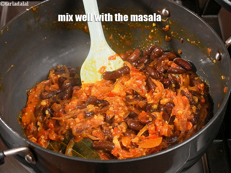 Step 37 – Mix well with the masala.