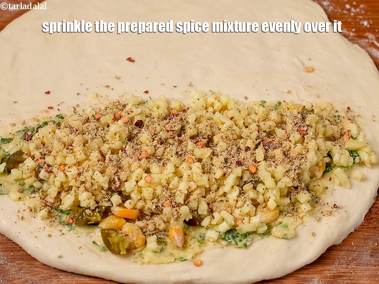 Step 38 – Sprinkle 1 tsp of the prepared spice mixture evenly over it.