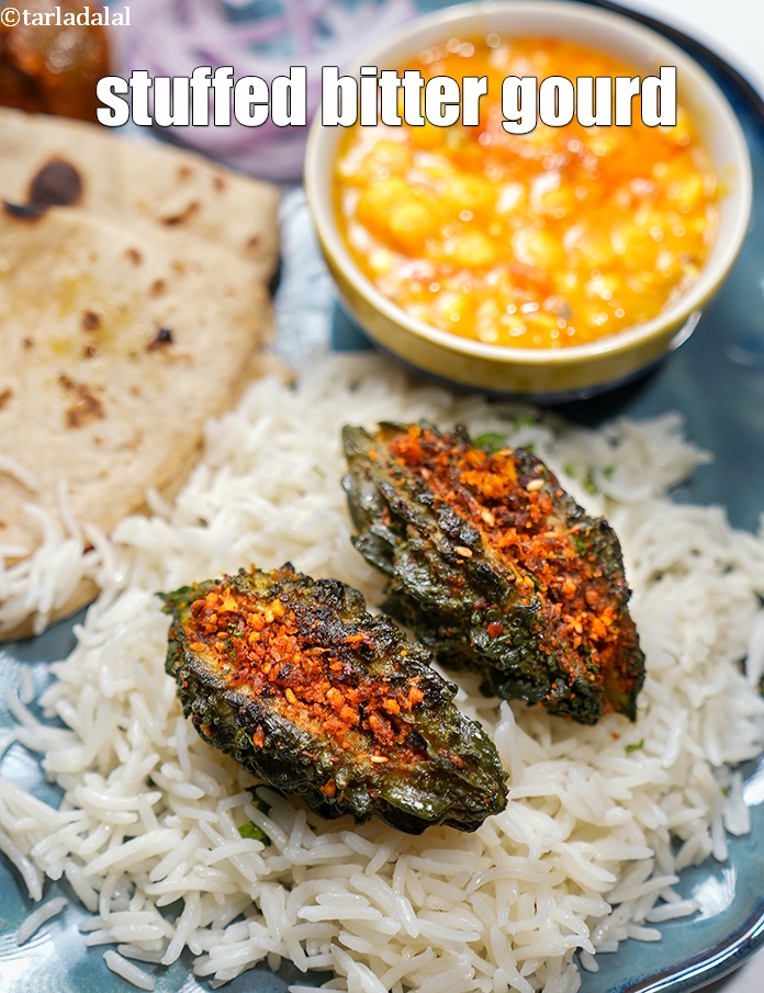 स्टेप 37 – <strong>भरवा करेला</strong>&nbsp;तुरंत&nbsp;परोसें ।