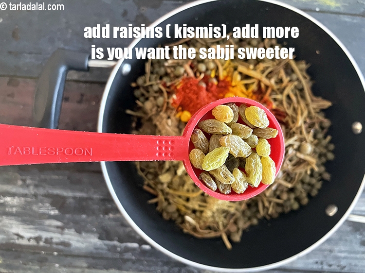 Step 40 – Add&nbsp;<meta charset="UTF-8" />1 tablespoon&nbsp;<a href="glossary-raisins-kishmish-kismis-597i">raisins (kismis)</a>.