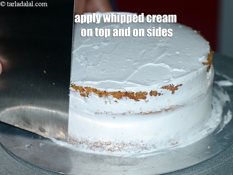 Step 39 – Apply little whipped cream on the top and on the sides to cover the cake …