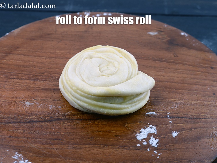 Step 44 – Roll it over again from one end to the other end to form a swiss …