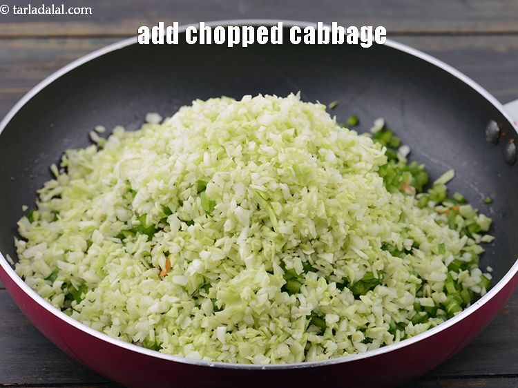 Step 39 – Add 1 cup&nbsp;finely&nbsp;<a href="https://www.tarladalal.com/glossary-chopped-cabbage-781i">chopped cabbage</a>.