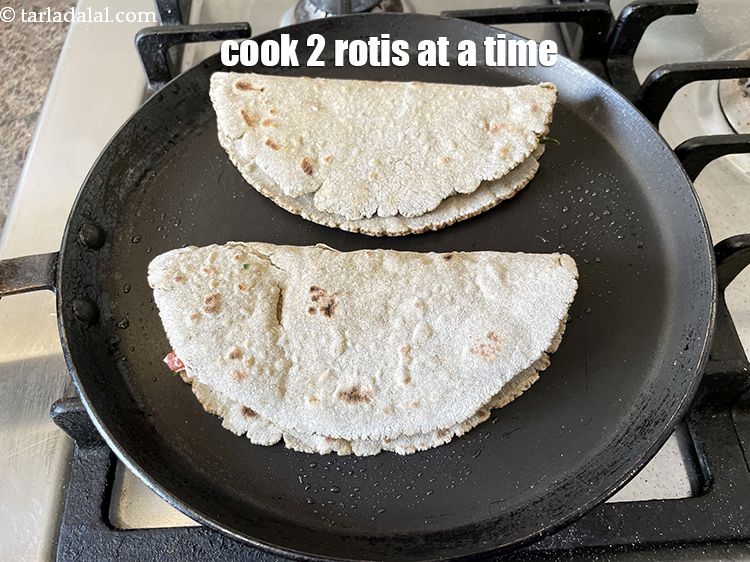 Step 40 – You can cook 2 rotis at a time.&nbsp;