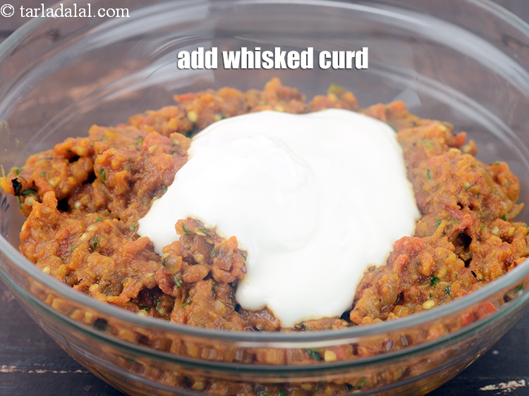 Step 37 – Add &frac12; cup whisked&nbsp;<a href="https://www.tarladalal.com/glossary-curd-dahi-yogurt-yoghurt-383i">curd (dahi)</a>.