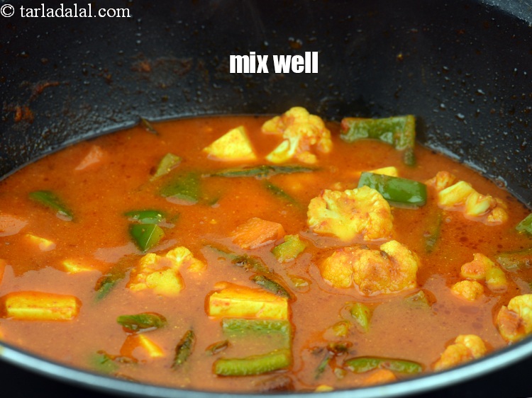 Step 38 – Mix well and cover and cook with a lid and cook on a medium flame …