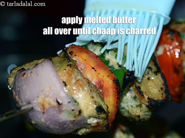 Step 41 – Apply <a href="https://www.tarladalal.com/glossary-melted-butter-1941i">melted butter</a> all over until the chaap is charred for better taste and …