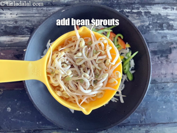 Step 39 – Add&nbsp;<meta charset="UTF-8" />3/4 cup&nbsp;<a href="glossary-bean-sprouts-193i">bean sprouts</a>.