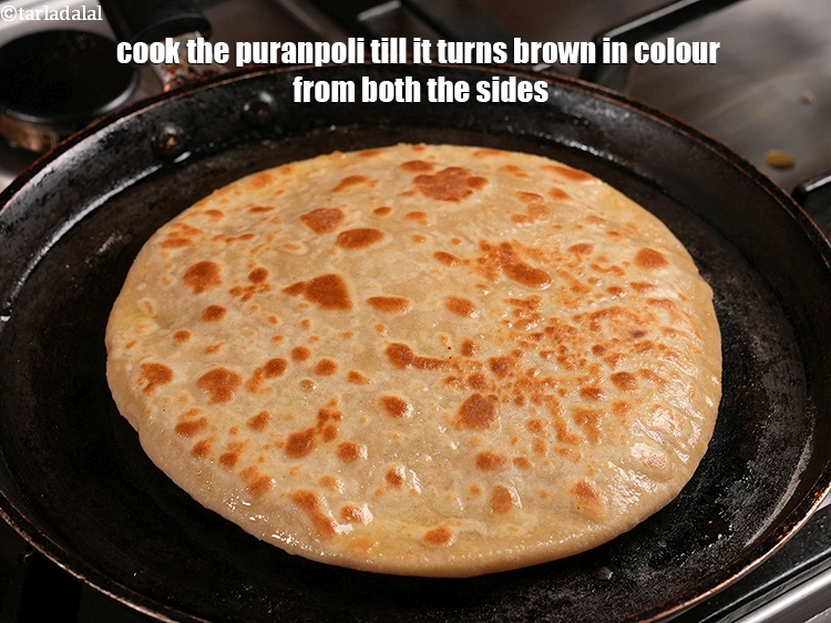 Step 38 – Cook the puranpoli till it turns brown in colour from both the sides.
