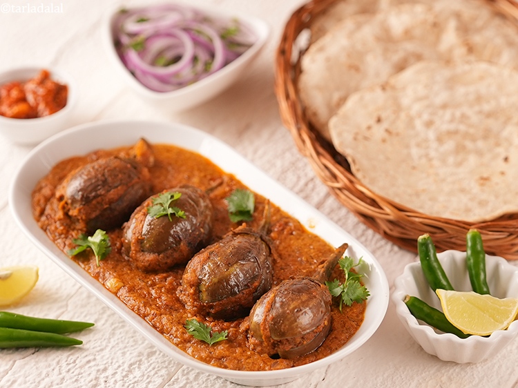 Step 38 – <strong>Bharwan Baingan Masala</strong> is a flavorful and aromatic sabzi featuring eggplants stuffed with a spicy, …