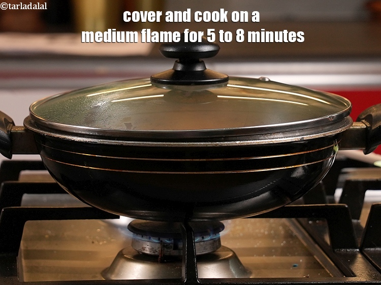 Step 38 – Cover and cook on a medium flame for 5 to 8 minutes.