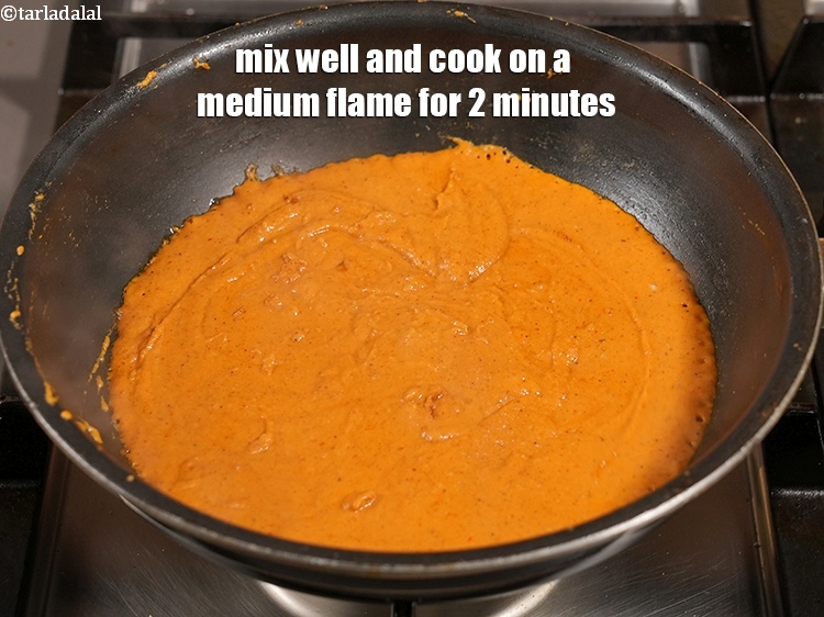 Step 38 – Mix well and cook on a medium flame for 2 minutes.